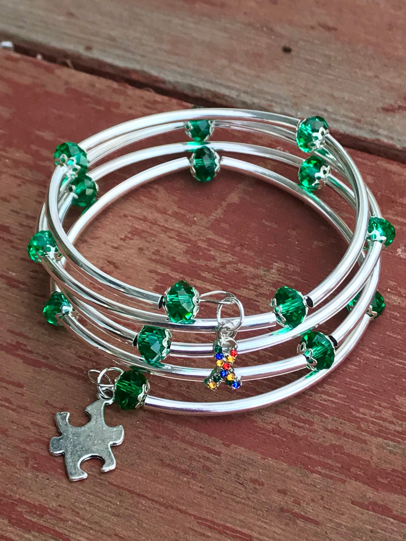 Autism awareness bracelet memory wire dark green crystal silver noodle beads