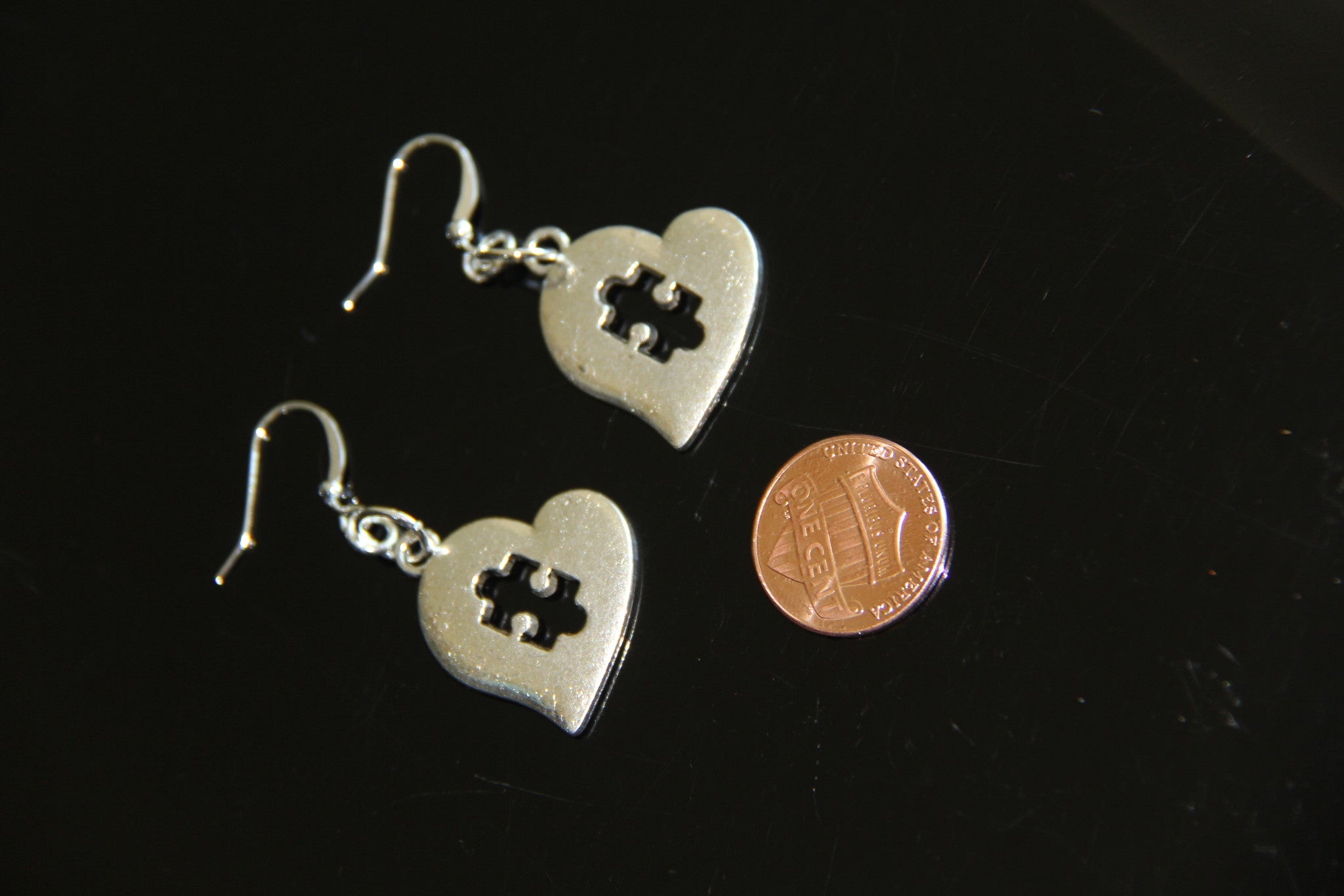 Silver puzzle heart ear rings