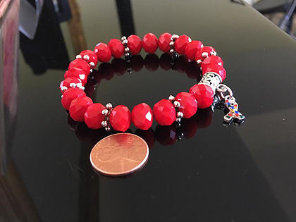 Red rondelle glass beads with Autism charm