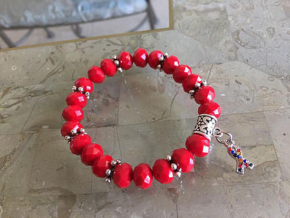 Red rondelle glass beads with Autism charm