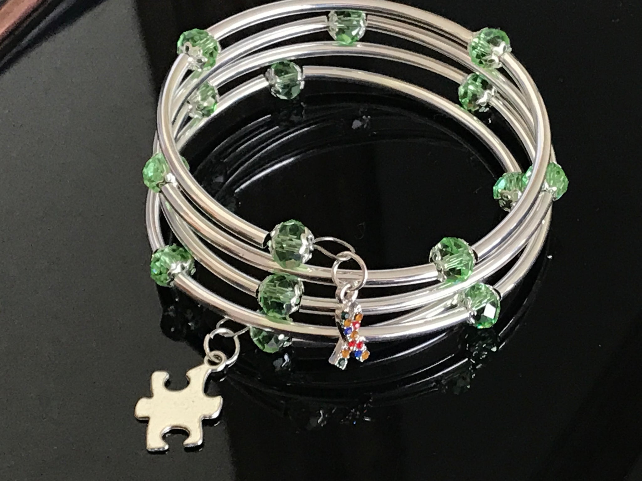 Autism Awareness bracelet memory wire lite green crystal silver noodle beads
